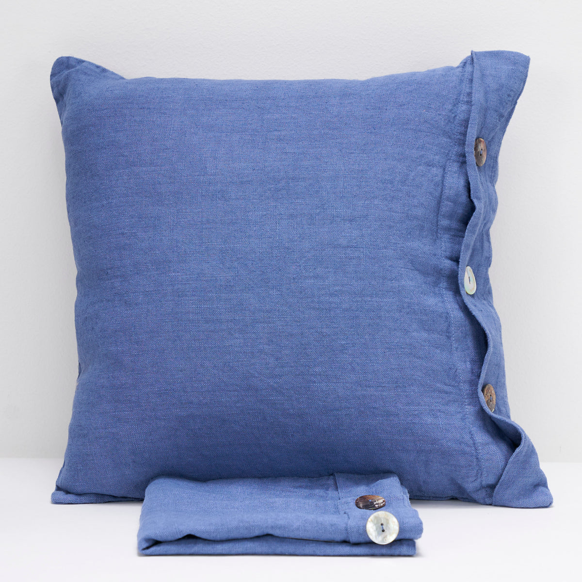 Pair of linen furnishing pillowcases with side buttons