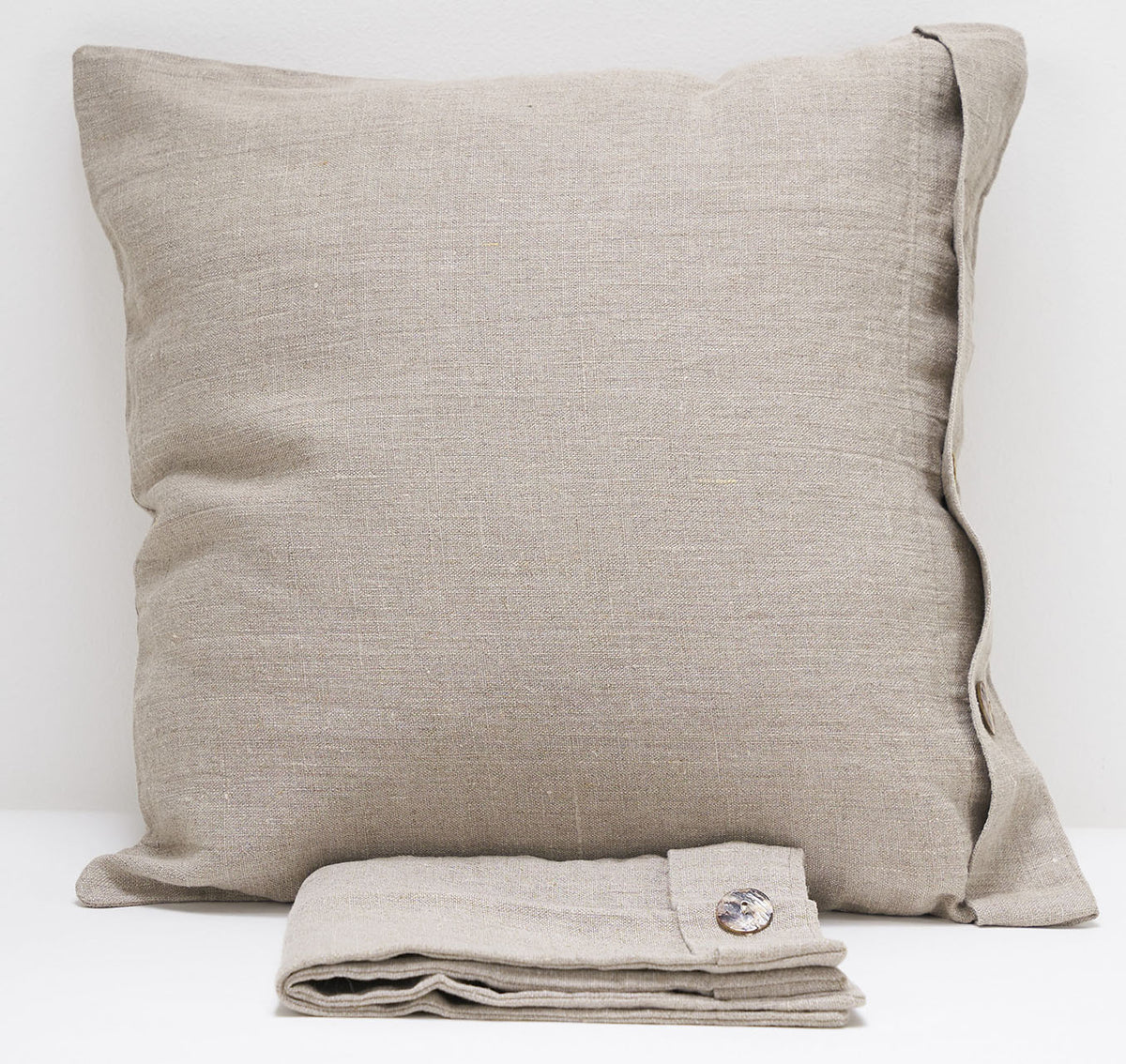 Pair of linen furnishing pillowcases with side buttons