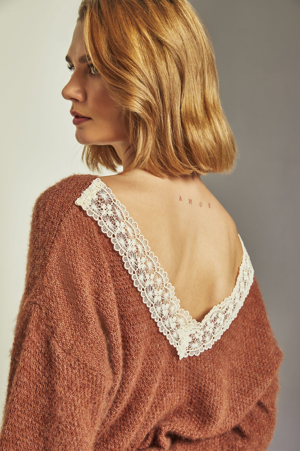Low-cut top with lace back