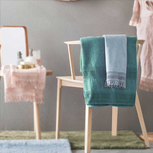 Terry shower towel with mesh embroidery * while stocks last